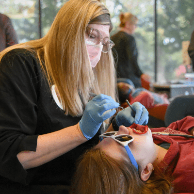 Dr. Parks working on a patient's teeth