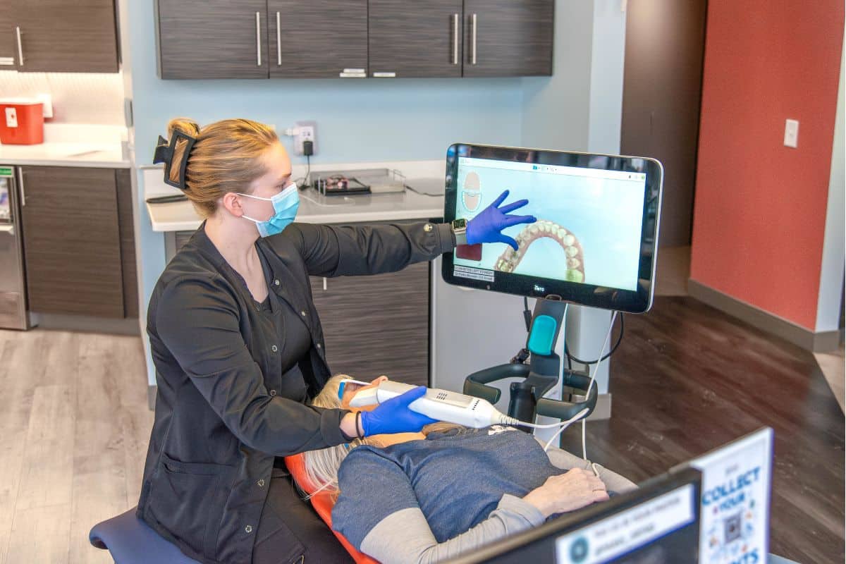 Dental hygienist using digital scanner for Invisalign at Parks Orthodontics in Tabb, VA