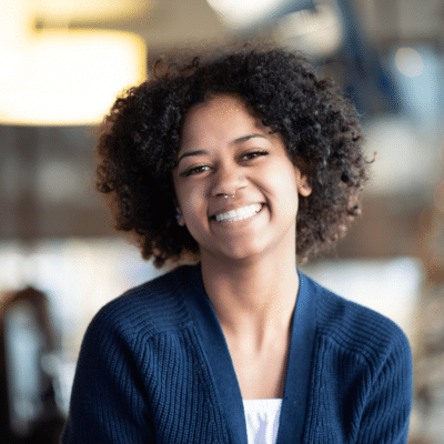 Female patient smiling, representing Virtual Invisalign Care AI