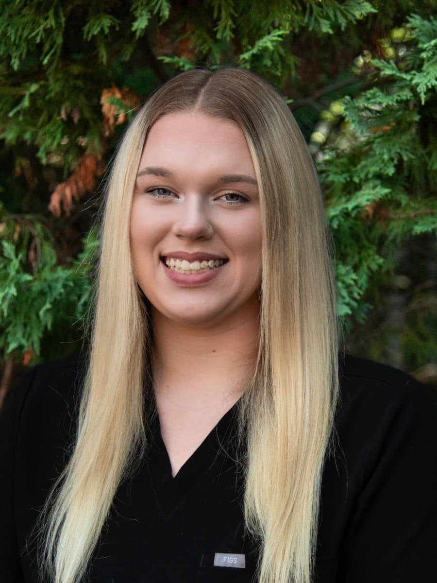 Autumn – Invisalign Specialist at Parks Orthodontics Yorktown Autumn, Invisalign specialist at Parks Orthodontics in Yorktown, smiling in the office